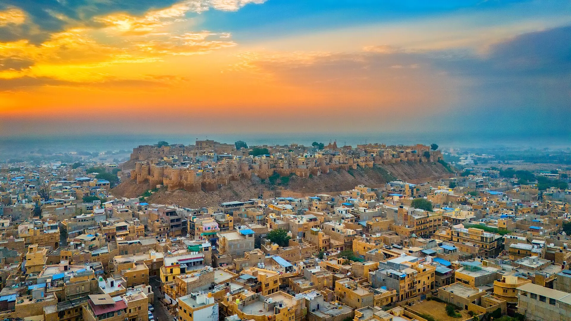 Jaisalmer Fort and the surrounding city at sunset